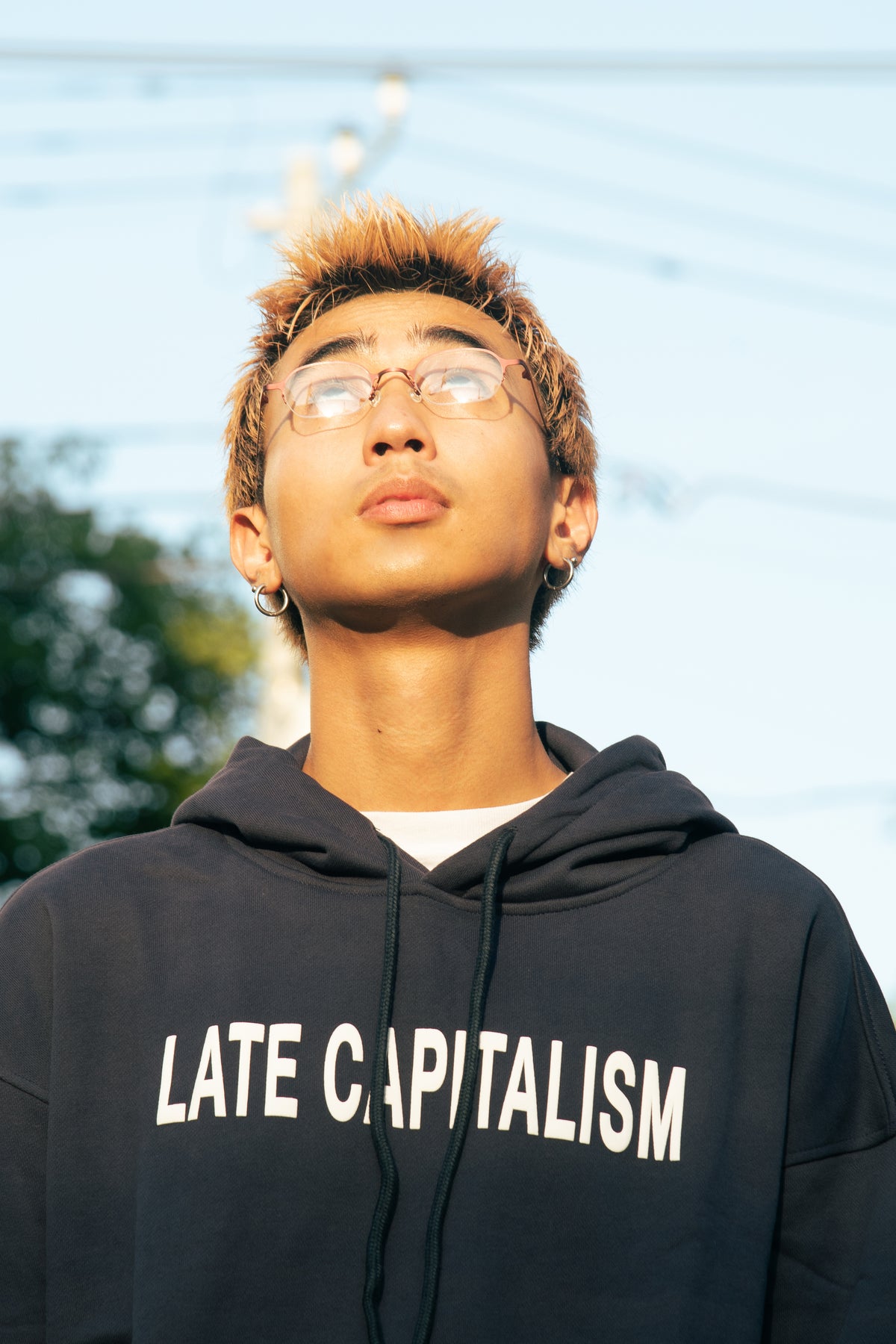 Late Capitalism Lightweight Hoodie, worn on model